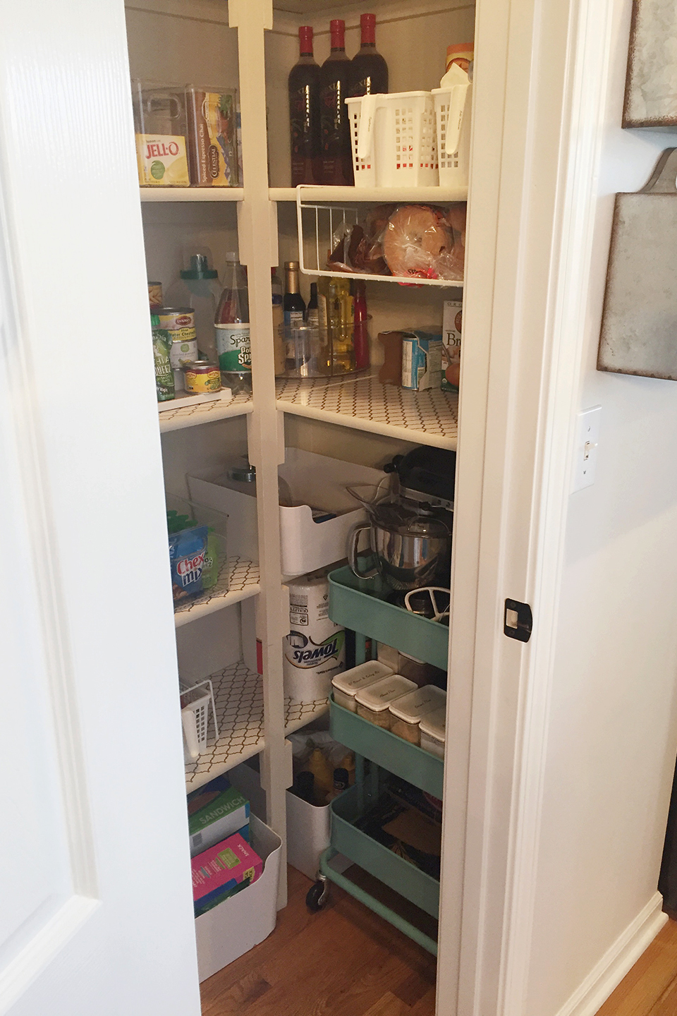 Blue baking cart tucked inside a closet | Organized Holiday