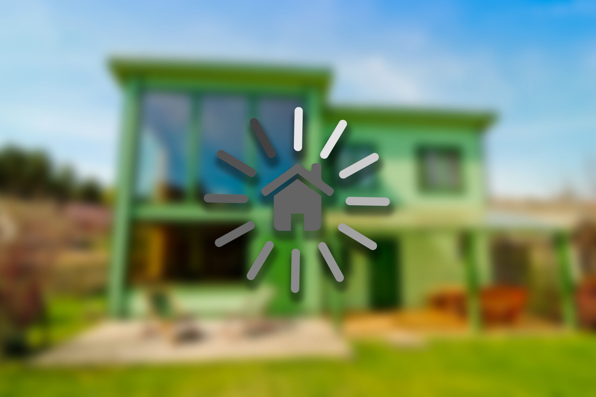 Loading bar circling around house against blurred out home