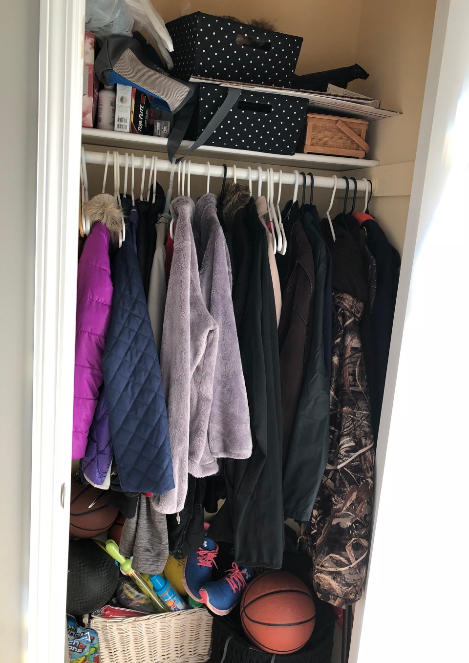 Chaotic hall closet awaiting organization