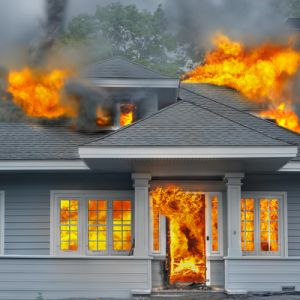 Fire engulfing a home