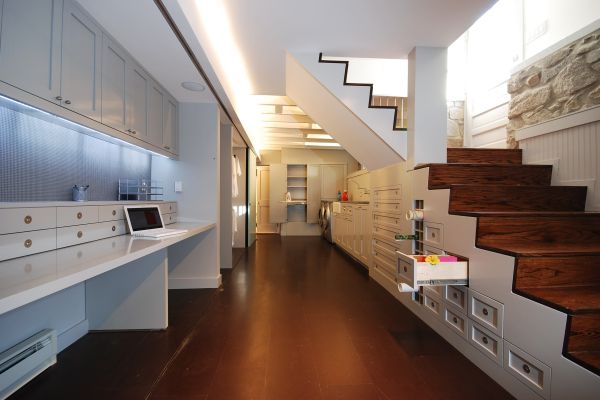 Custom basement under-stairs storage drawers