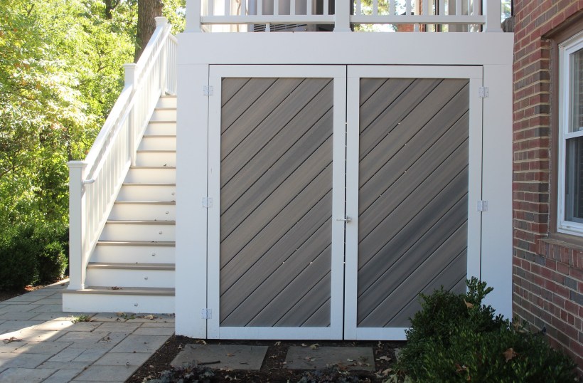 Custom under deck storage shed with double doors