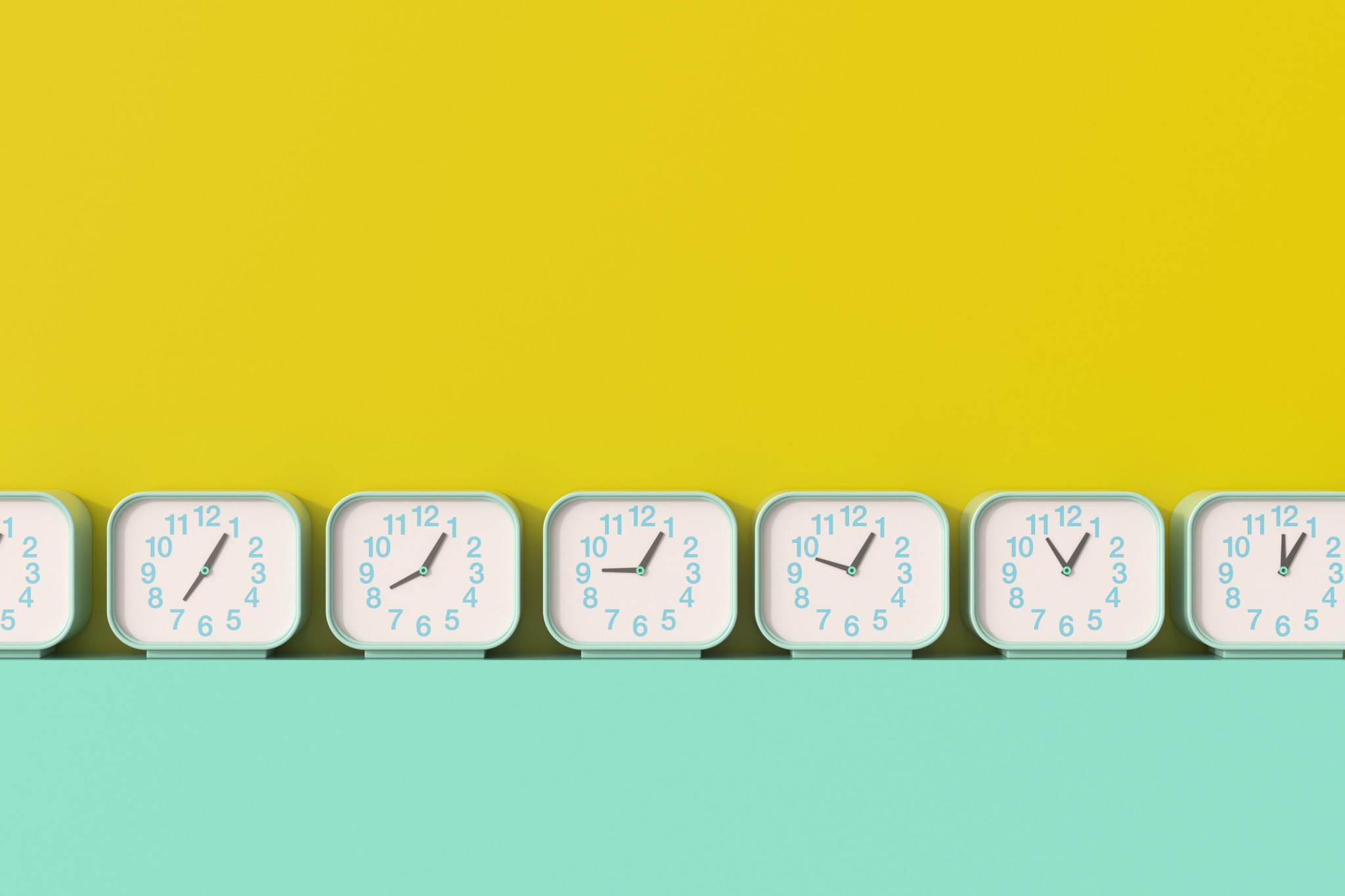 A bunch of matching clocks showing different times.