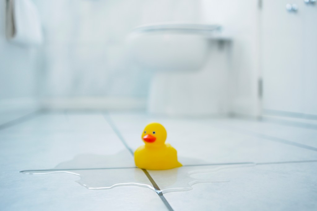 choosing-bathroom-flooring-rubber-duck-wet-tile