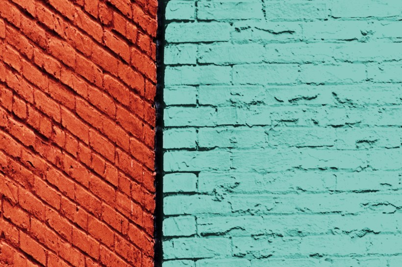 common easy home mistakes photograph of adjoining brick walls painted red and bluish-green colors