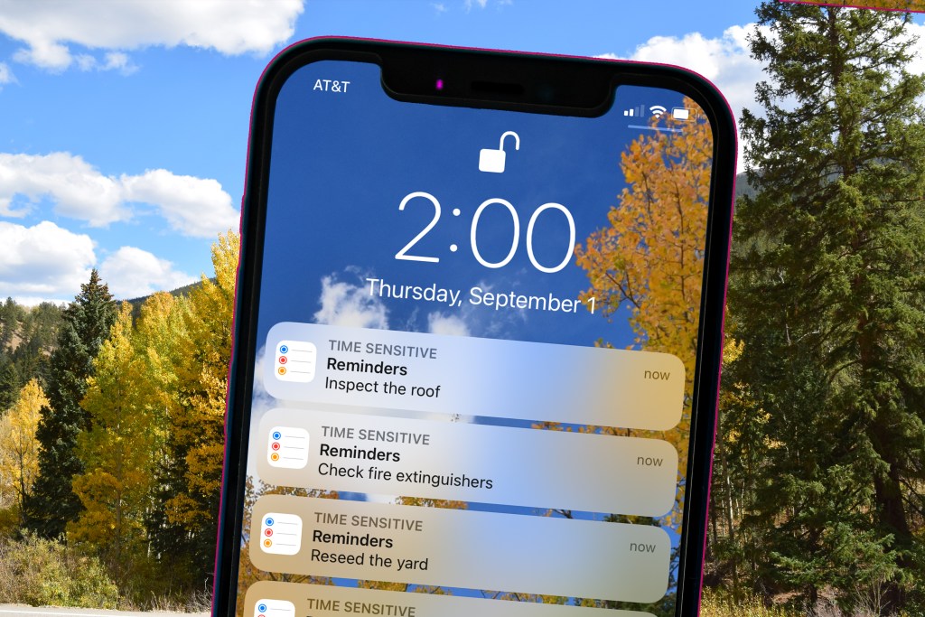 september do this now fall maintenance tips image of reminders on a phone to do tasks for fall maintenance with a background image of trees changing color in autumn