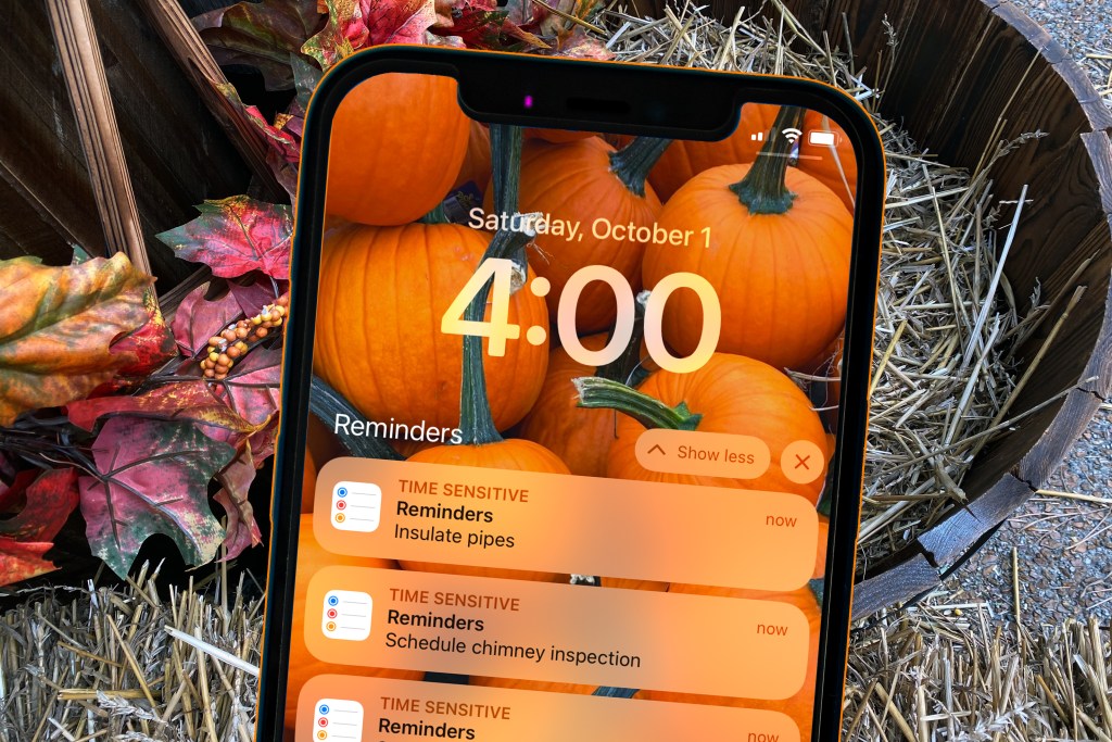 do this now october image of hay and fall leaves in the background with a cellphone that has a background image of colorful pumpkins and reminders set for fall autumn tasks