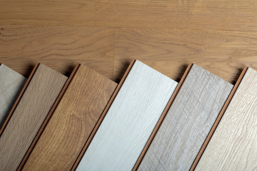 samples of laminate flooring with different pattern and wood texture and colors for hardwood floor alternative