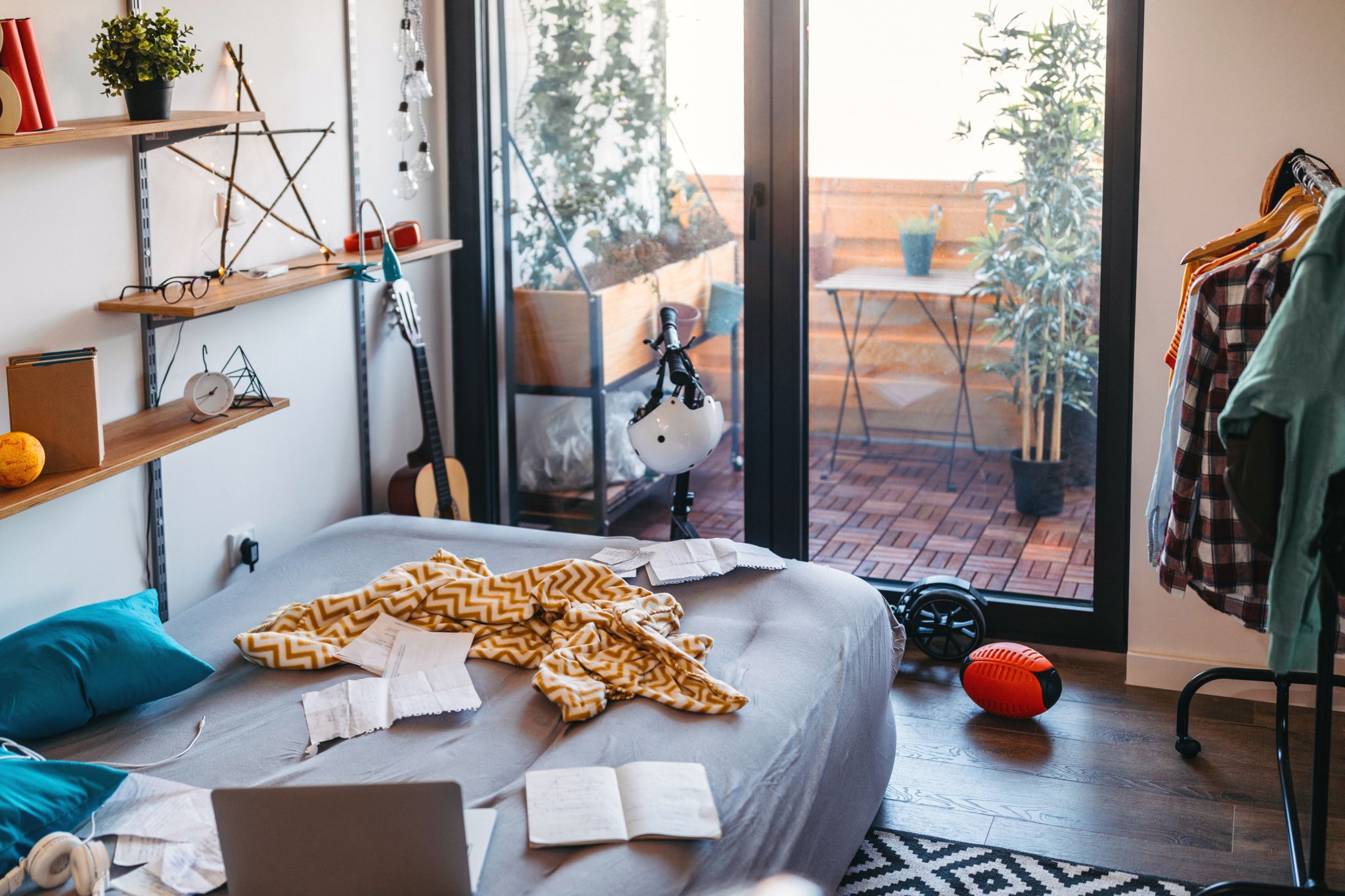 Cluttered mess in teenage bedroom of a home