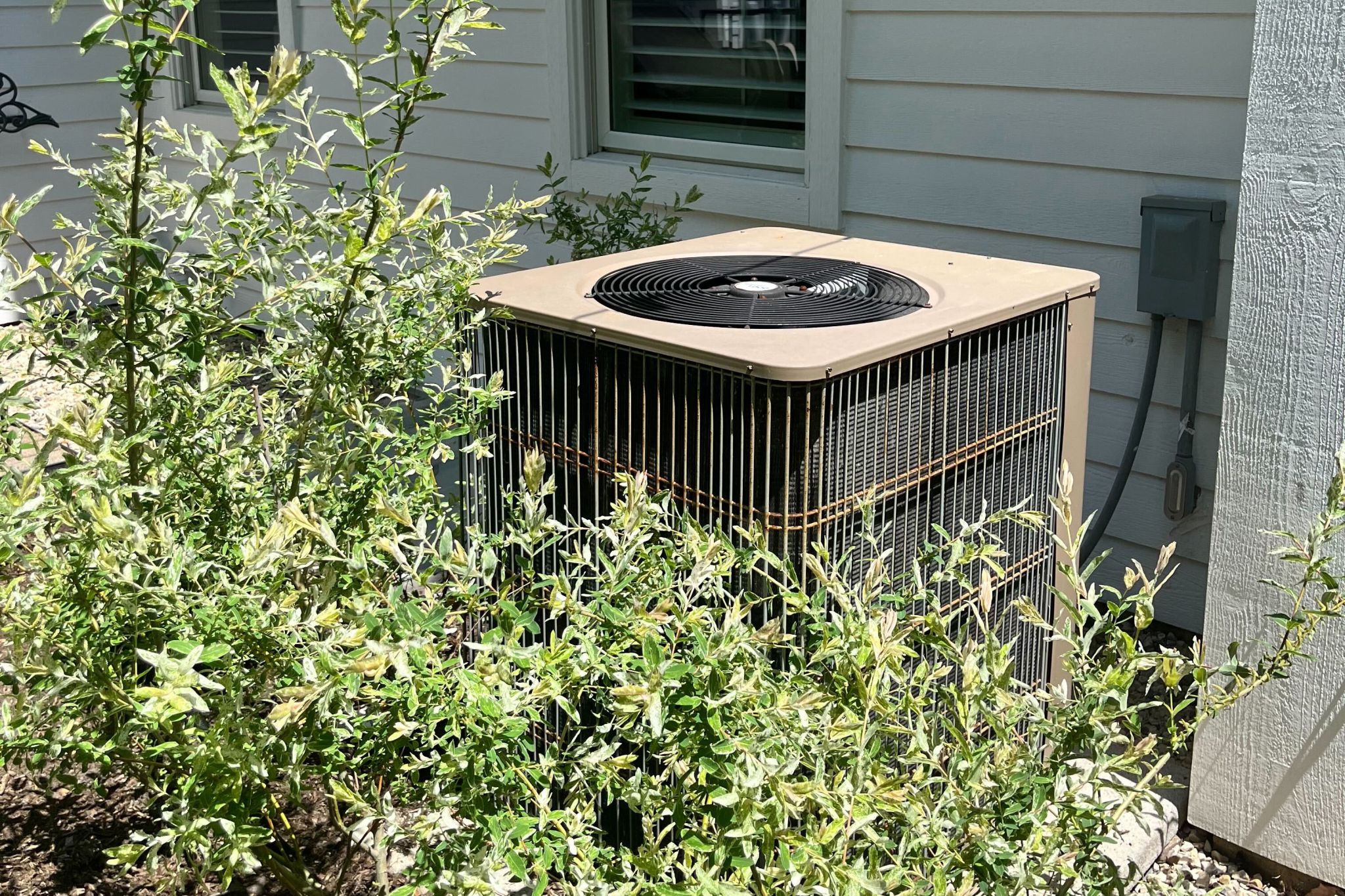 hvac important maintenance image of an old condenser