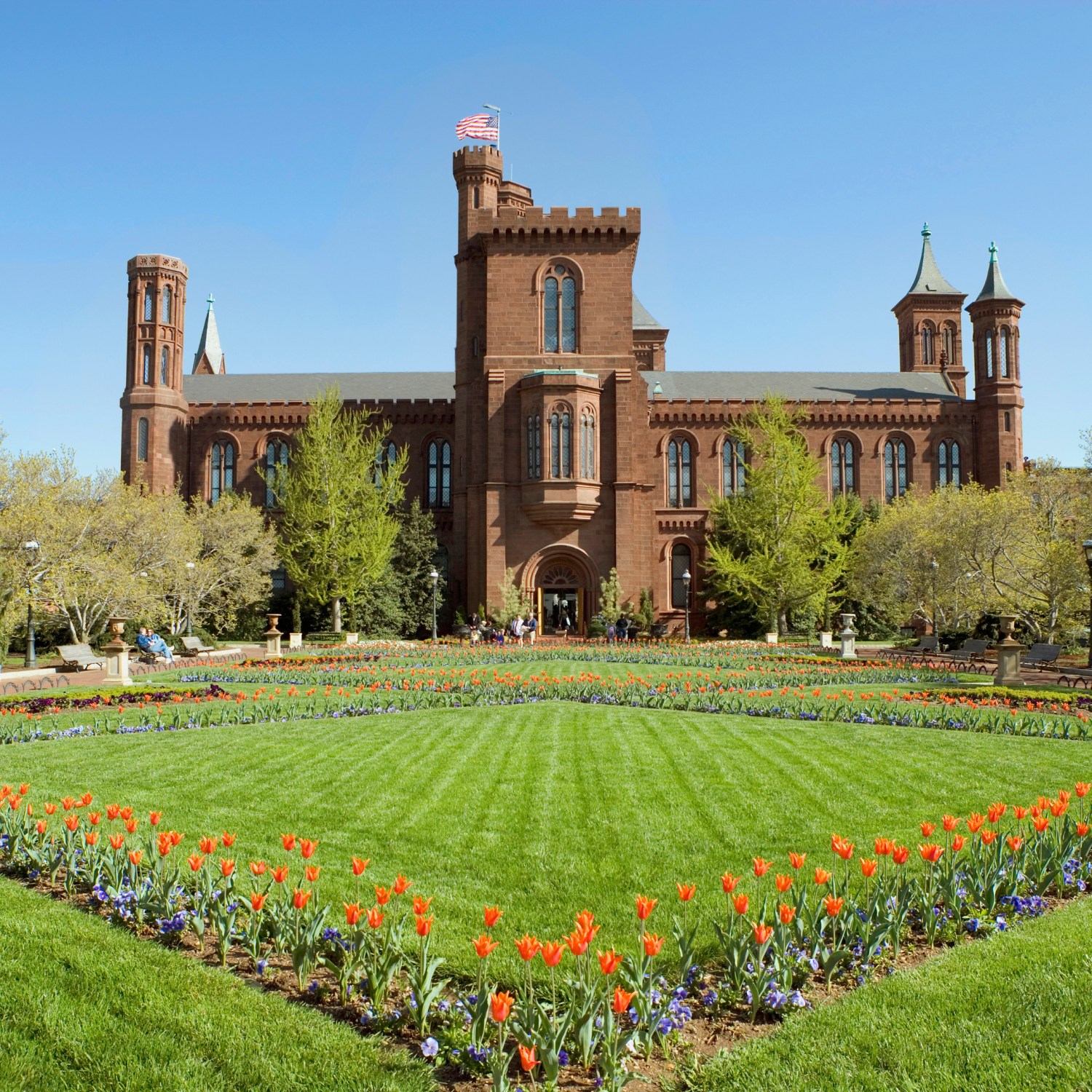expertly maintained garden, lawn and grounds in front of Smithsonian Institute Castle