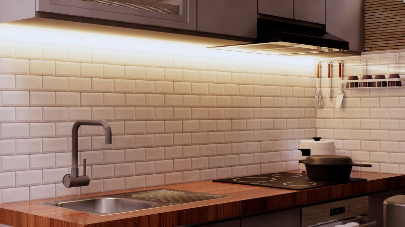 A modern, minimalist kitchen featuring LED lighting.