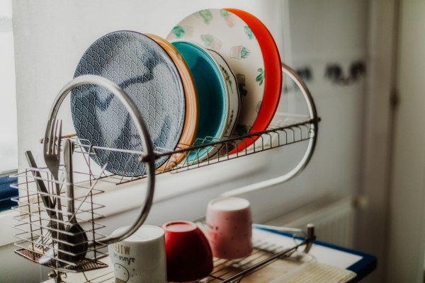 Plates on drying rack in the kitchen