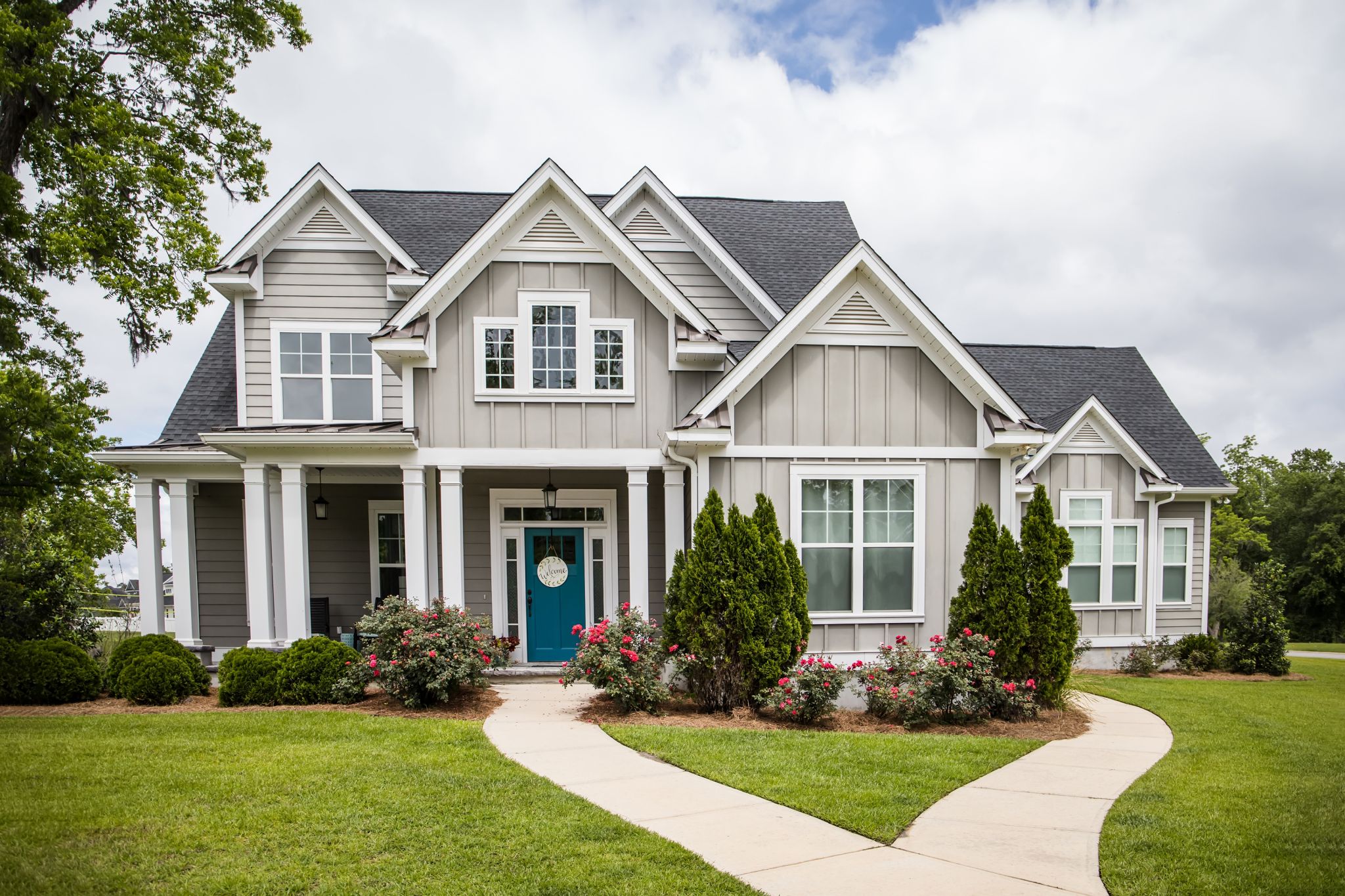 This new, magnificent cottage style family home has a beautiful front yard and offers stunning curb appeal.