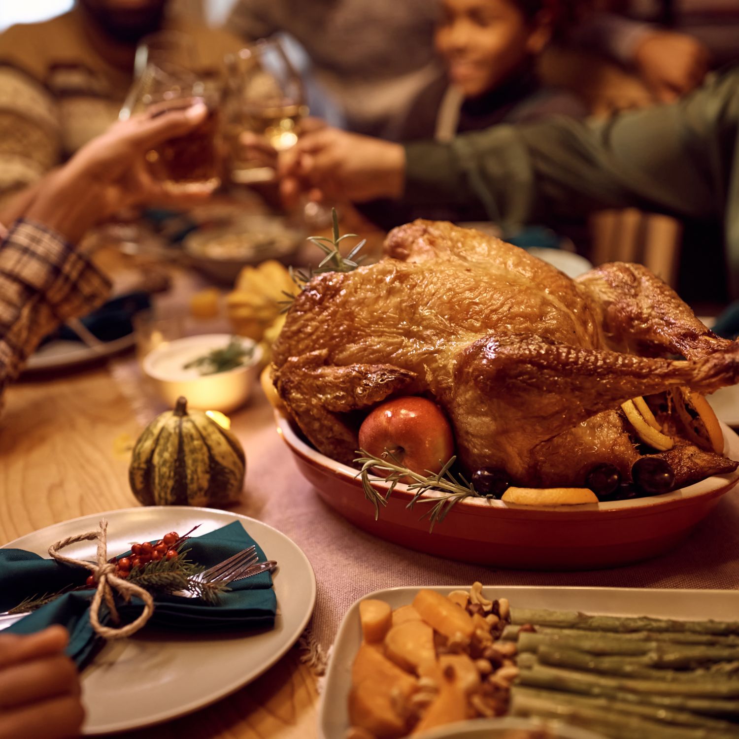 Close up of a Thanksgiving turkey during family dinner at the dining table.