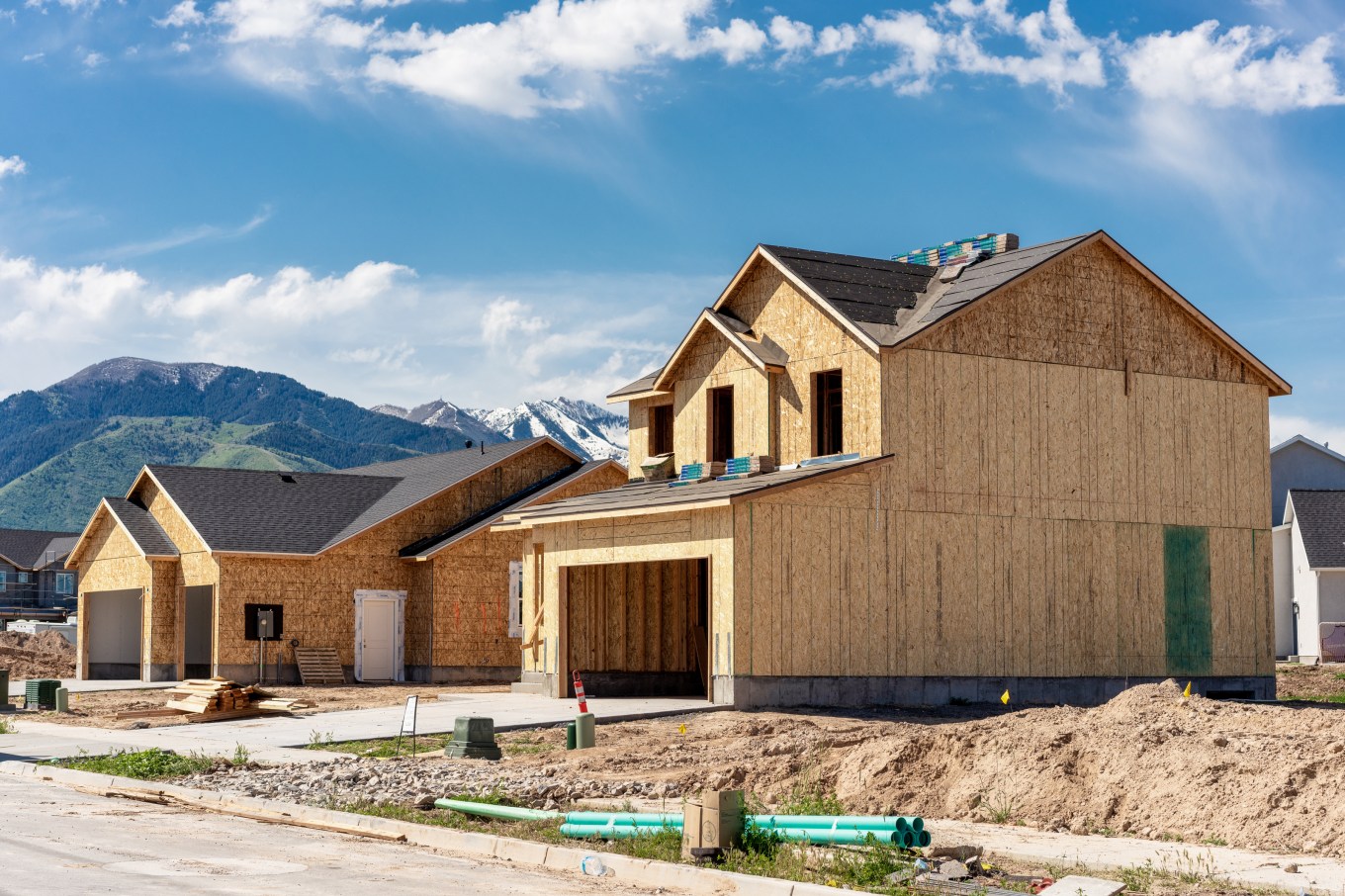 Building progress on a detached house in a housing development.