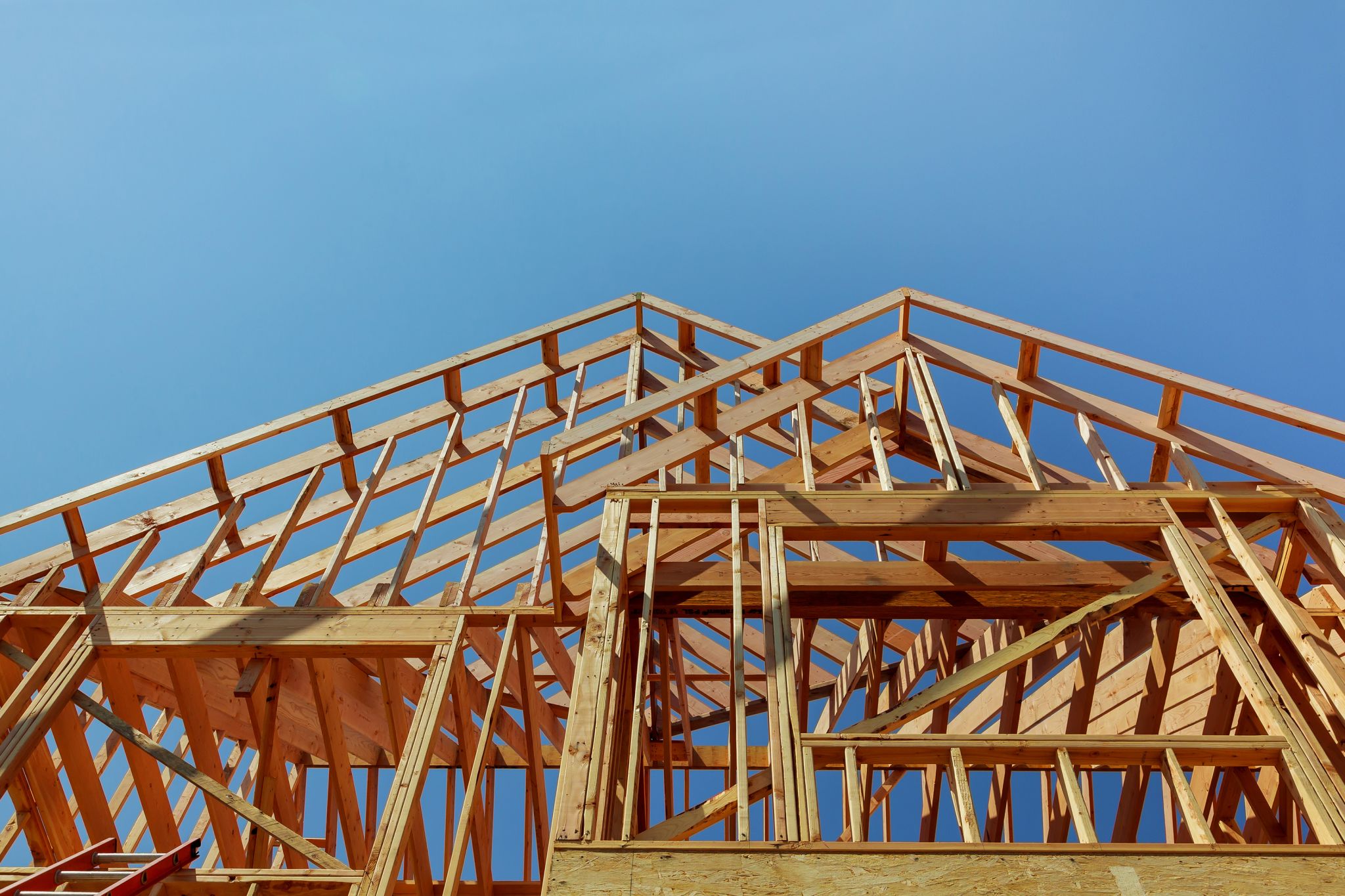 Interior wood framing of a new house under construction.