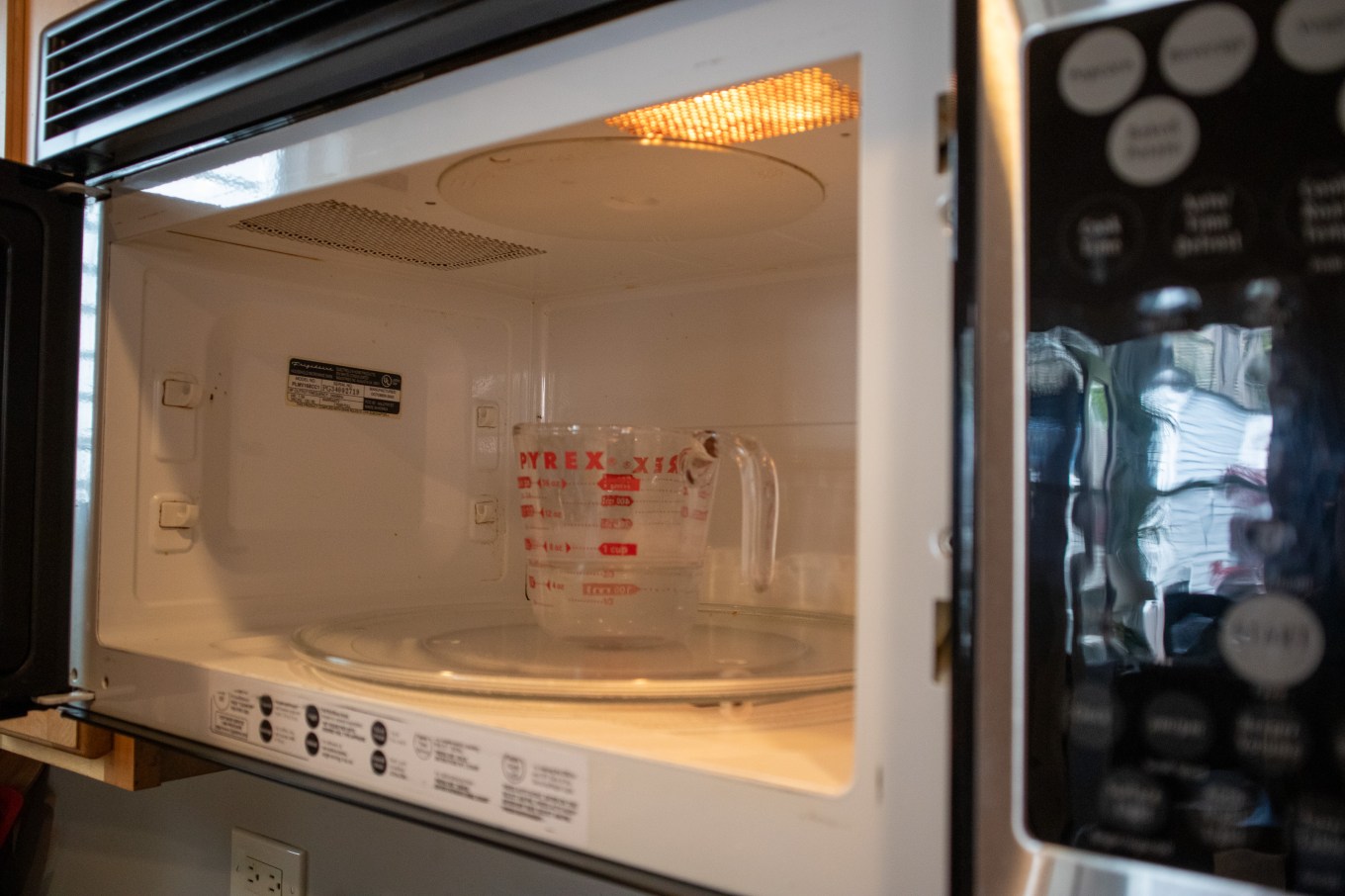Baking soda mixed with water to be used to clean a microwave.