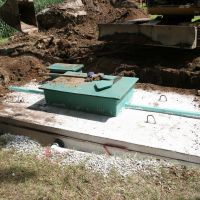 A septic system being constructed with a concrete wastewater reservoir.