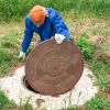 A man checking a plumbing well <a href=
