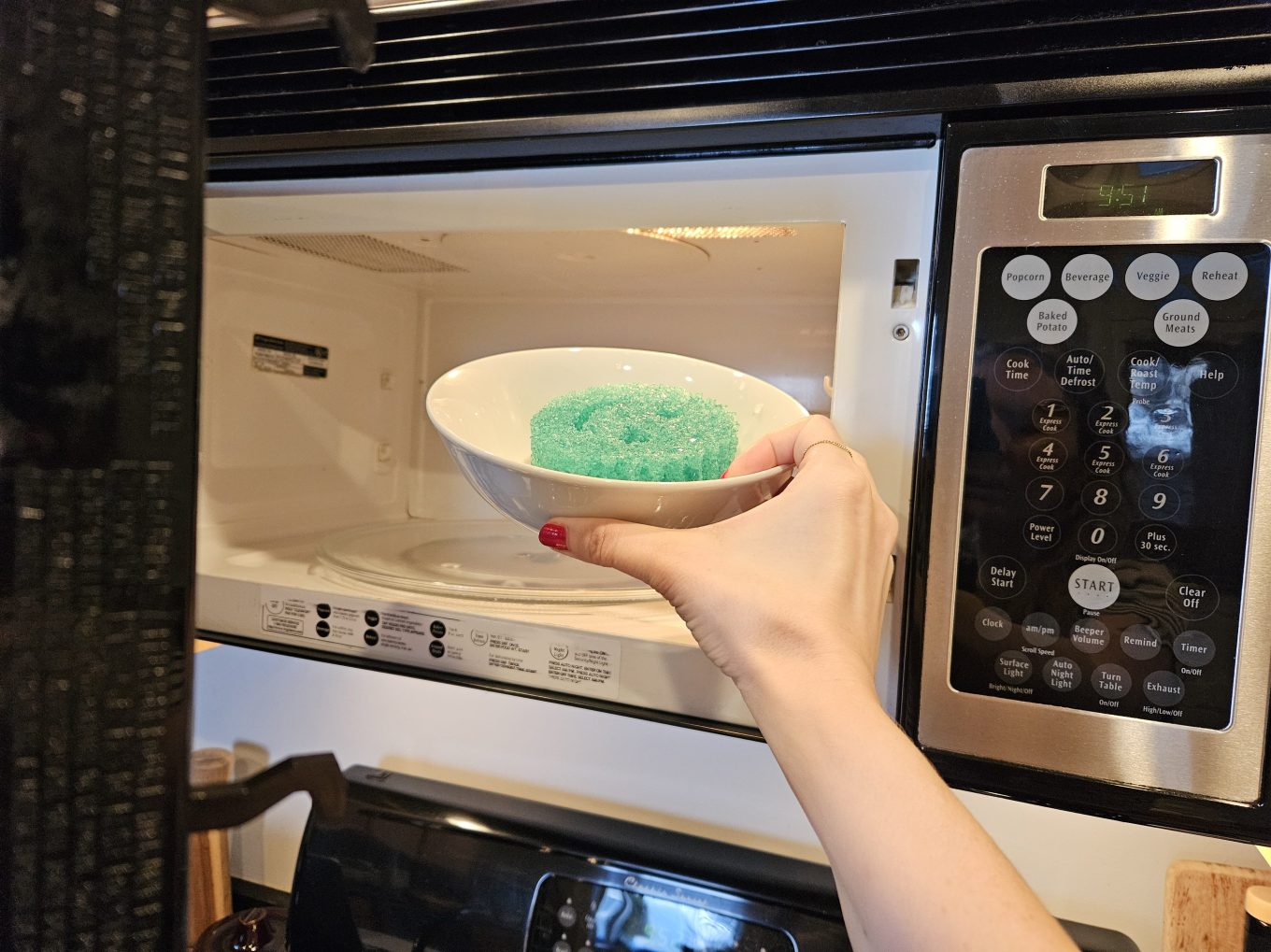 Putting a sponge in the microwave to kill bacteria.