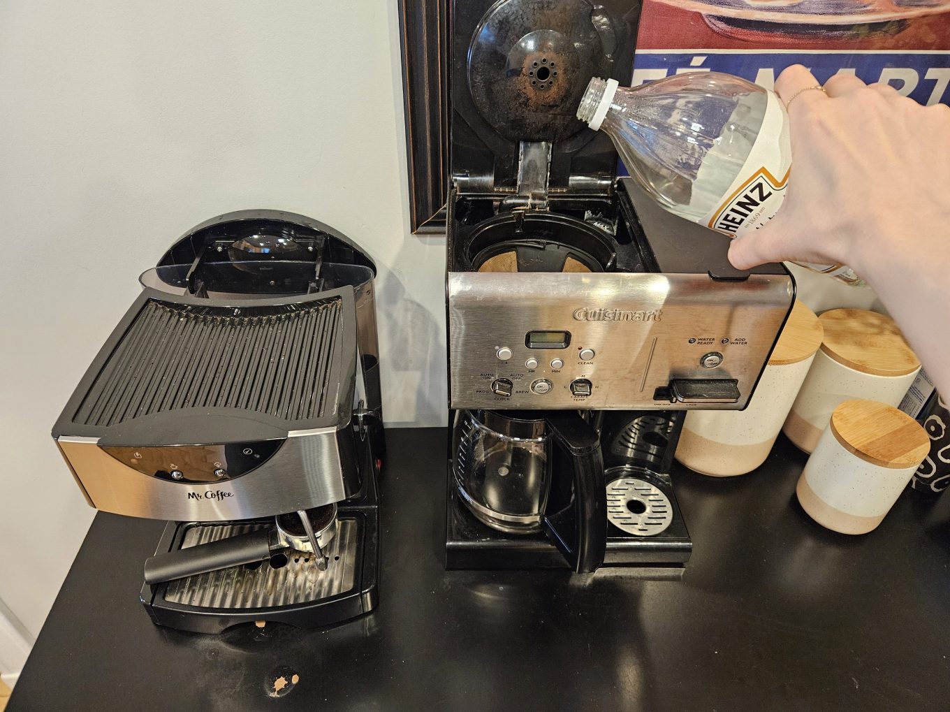 Using vinegar to clean the reservoir of a coffee machine.