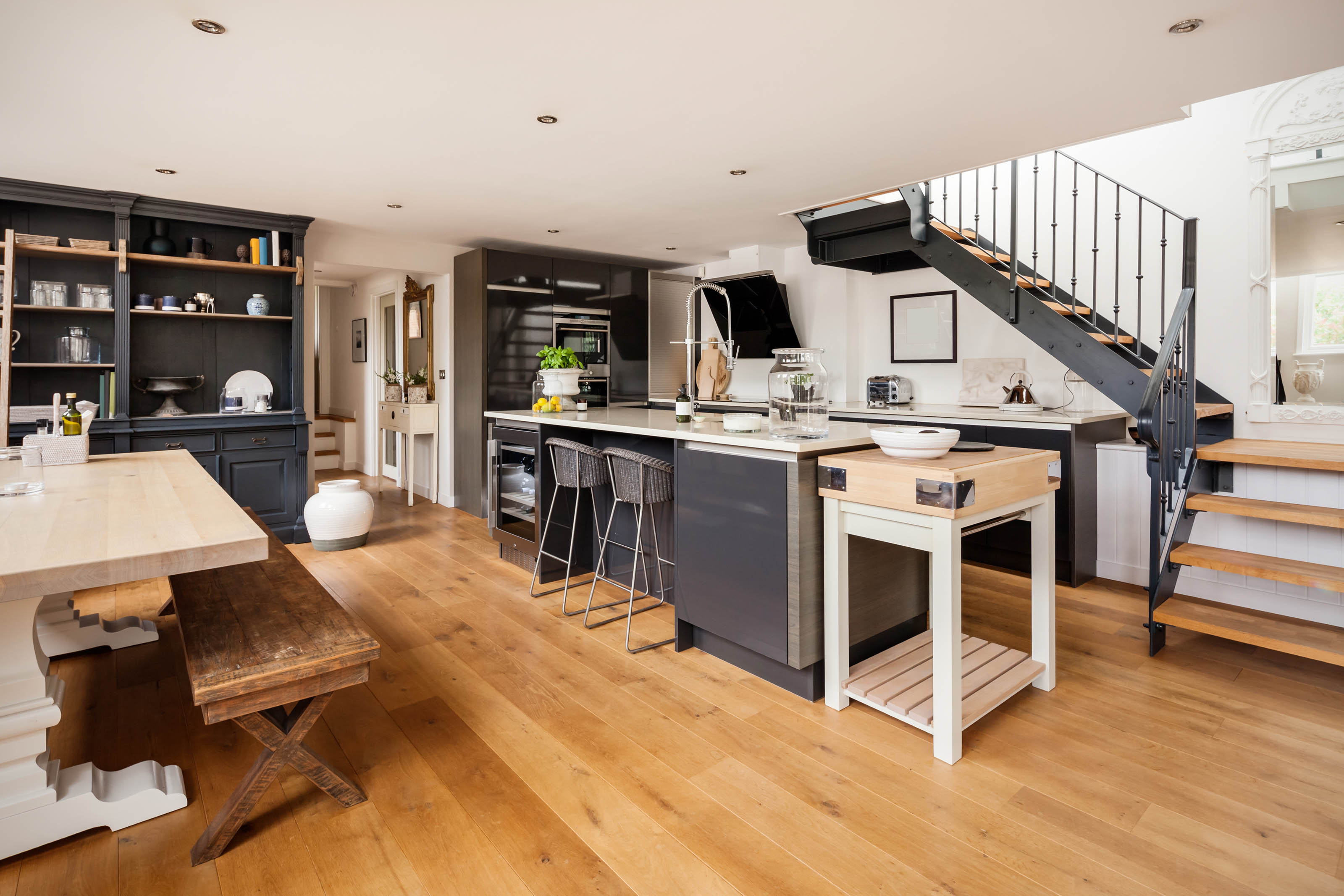 A nice, new hardwood floor shown in a modern kitchen.