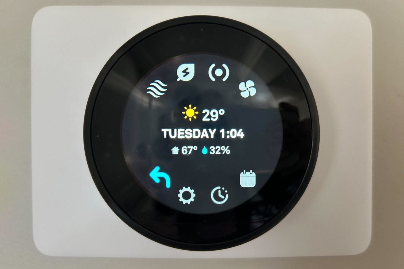 Close up of a smart thermostat.
