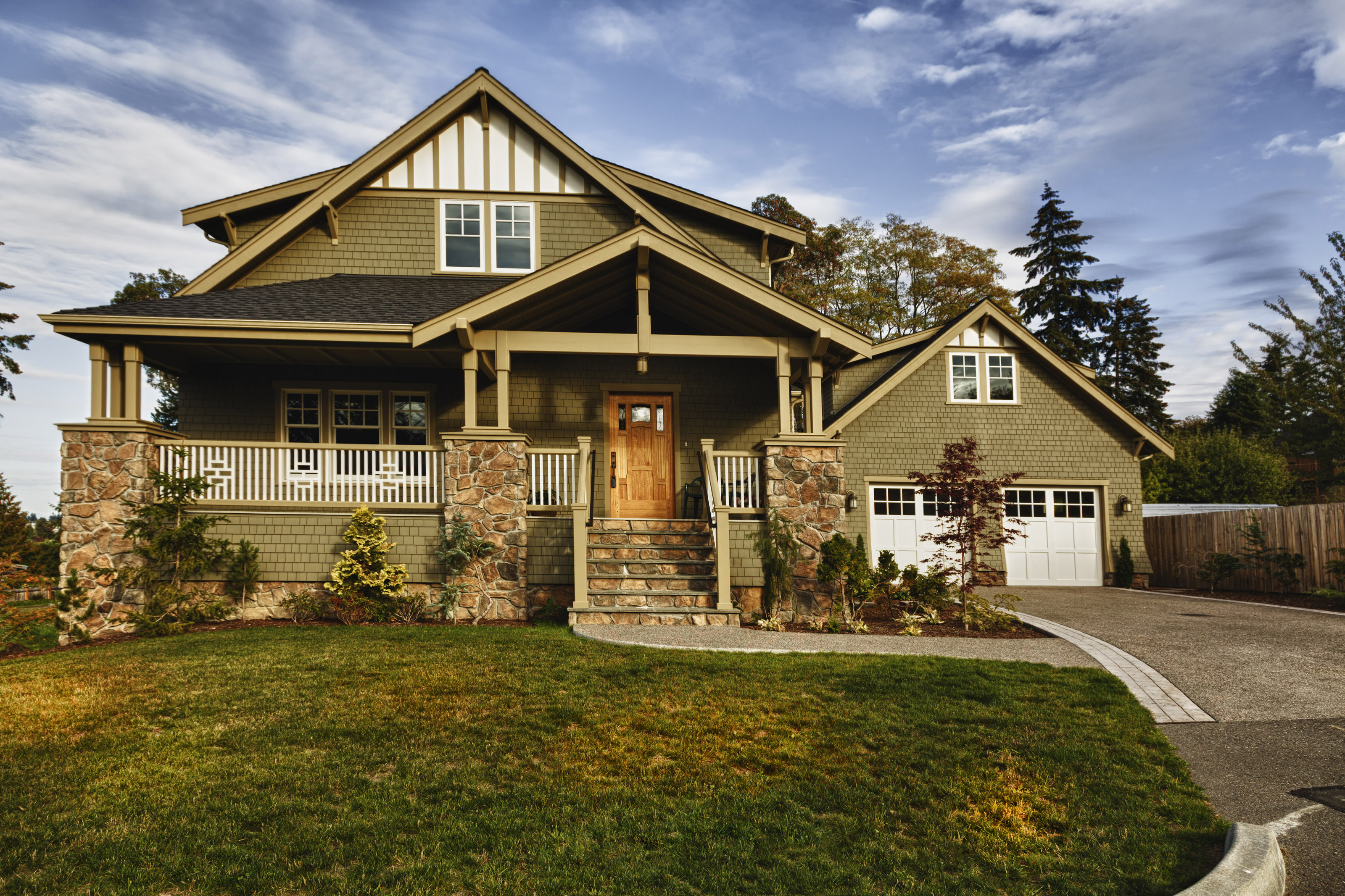 Suburban home with grass turning brown.