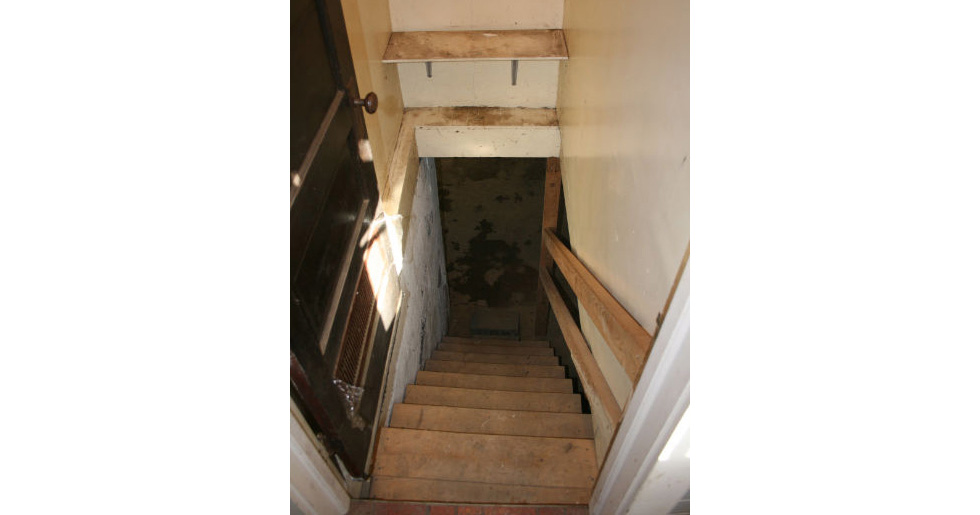 Basement stairway before renovation