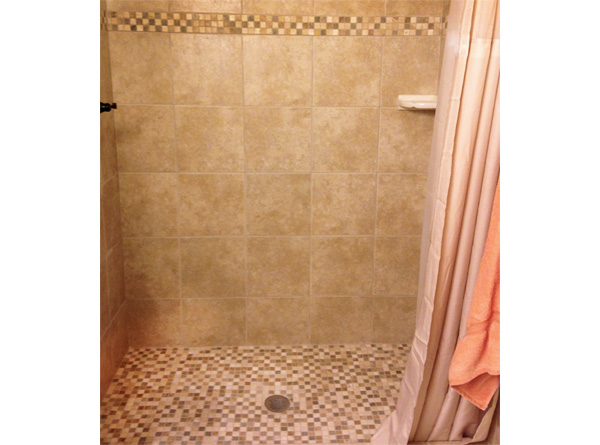 The tile in Lisa's basement bathroom