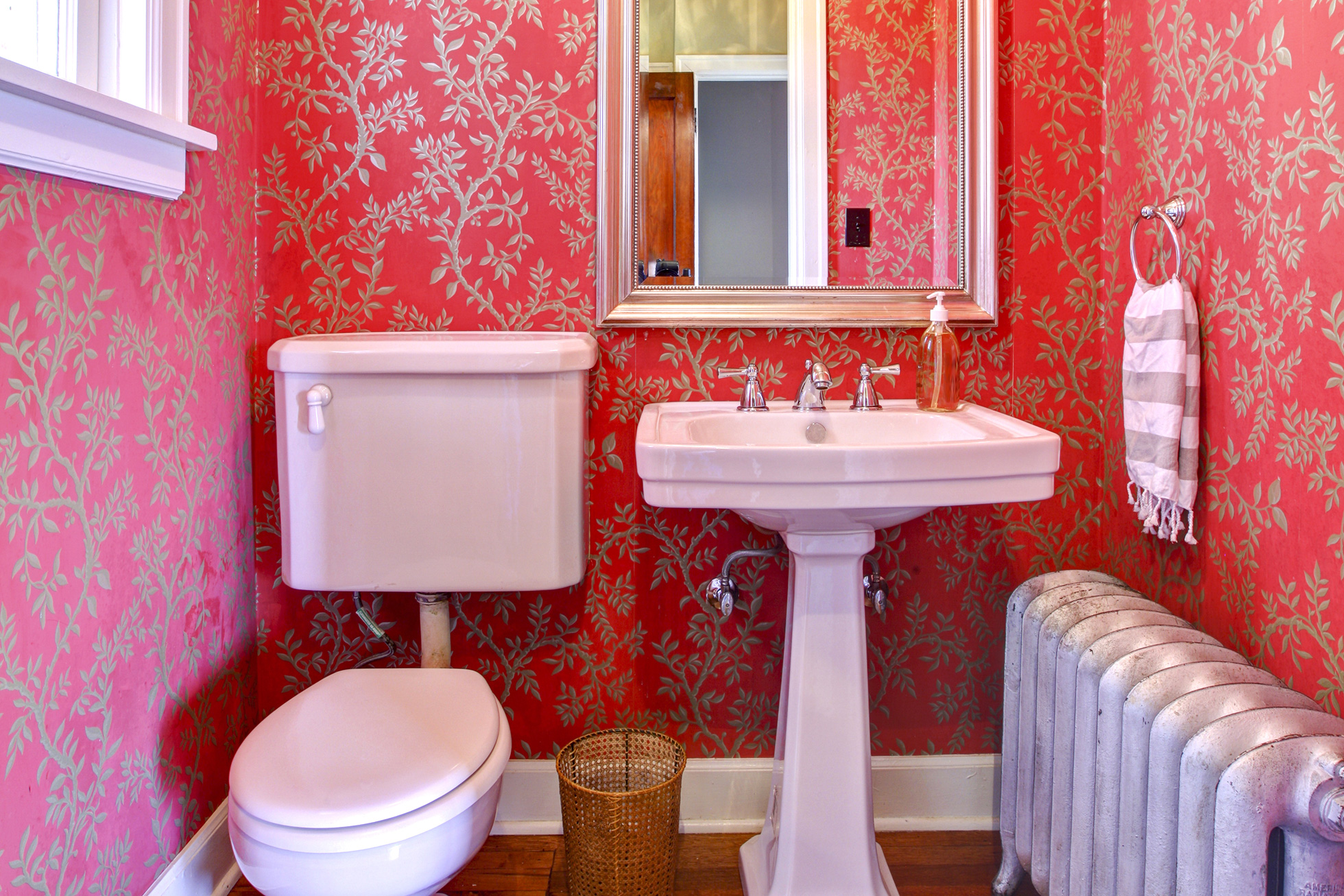 Bathroom with red wallpaper