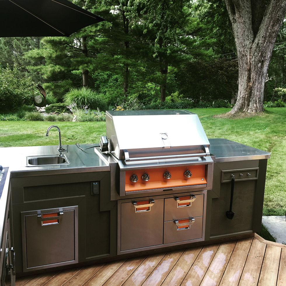 Black and orange stainless steel outdoor kitchen