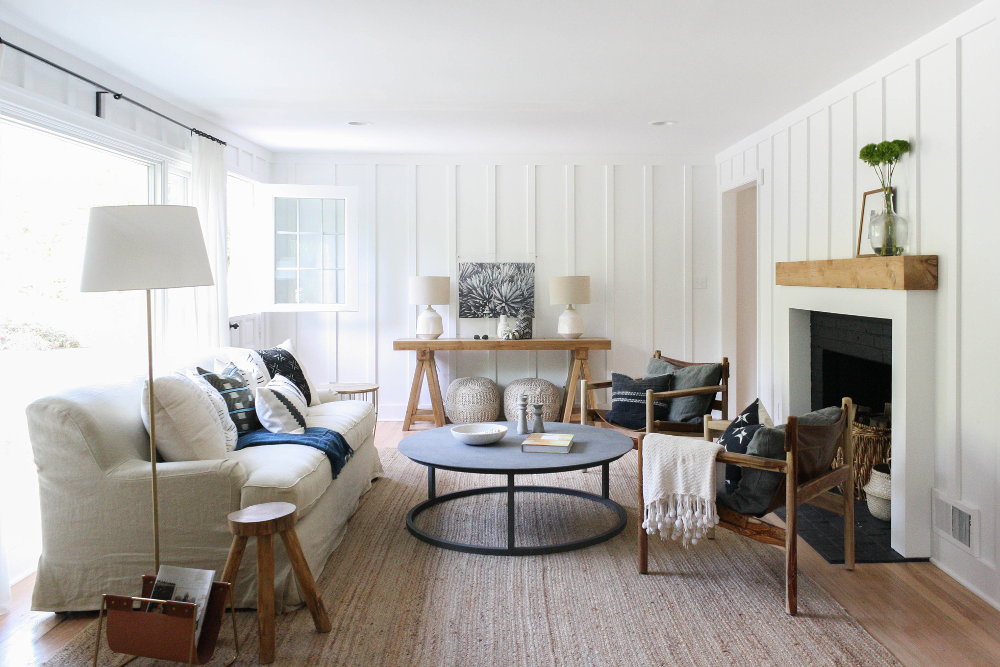 A white living room with molding