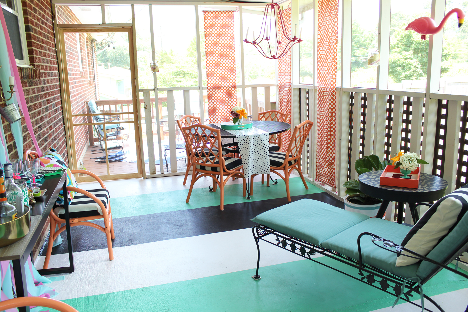 Blue, black, and gray painted enclosed porch
