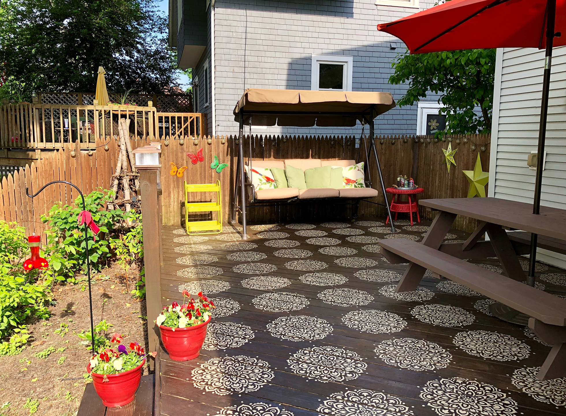 Brown deck with beige medallion deck rug stenciled across