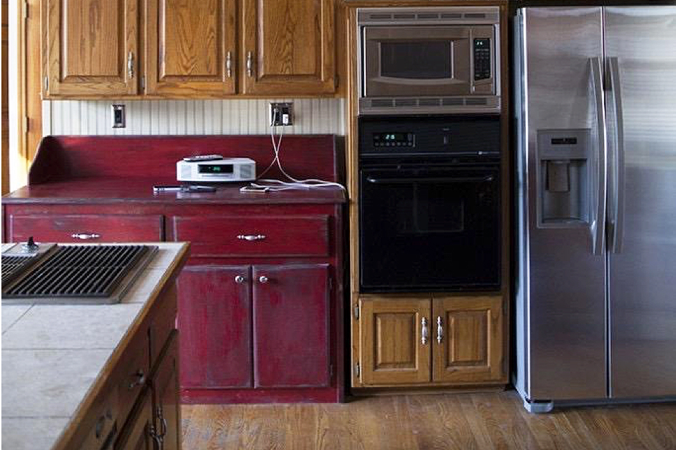 Gwen Hefner's pre-makeover kitchen with outdated cabinets