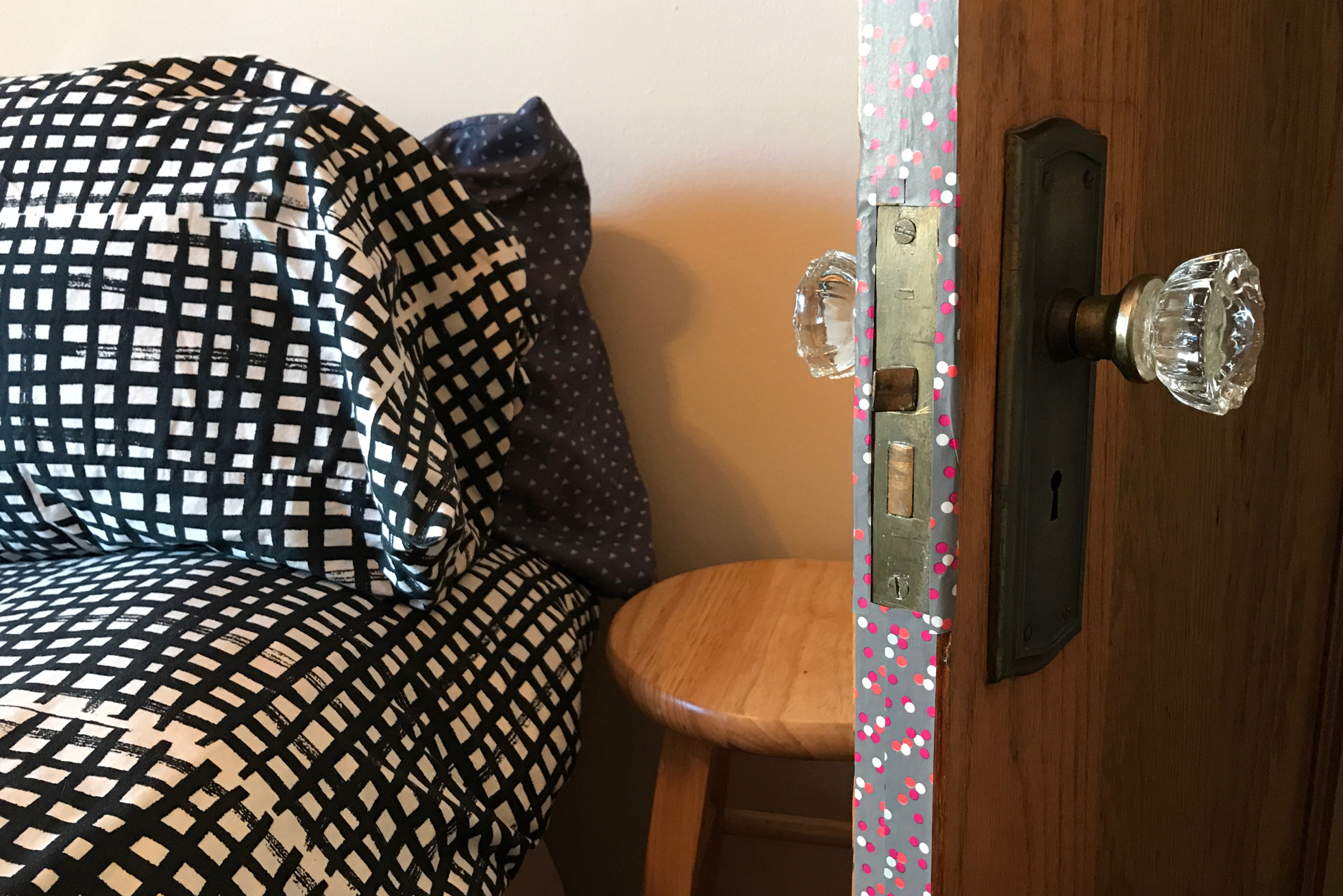 Polka dot gray washi tape on a wood door