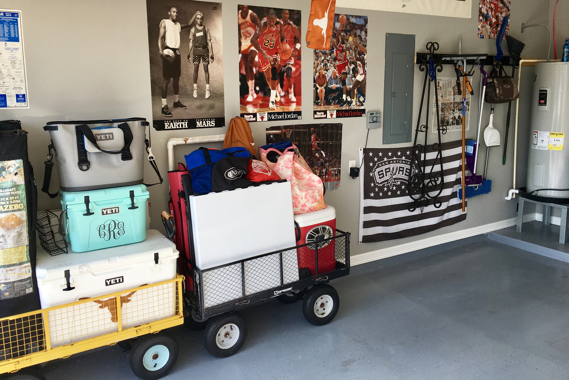Two metal carts with wheels in a garage