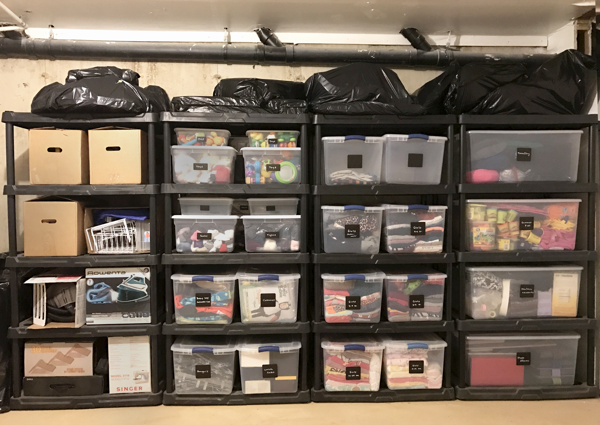 Wall of organizers in a home basement