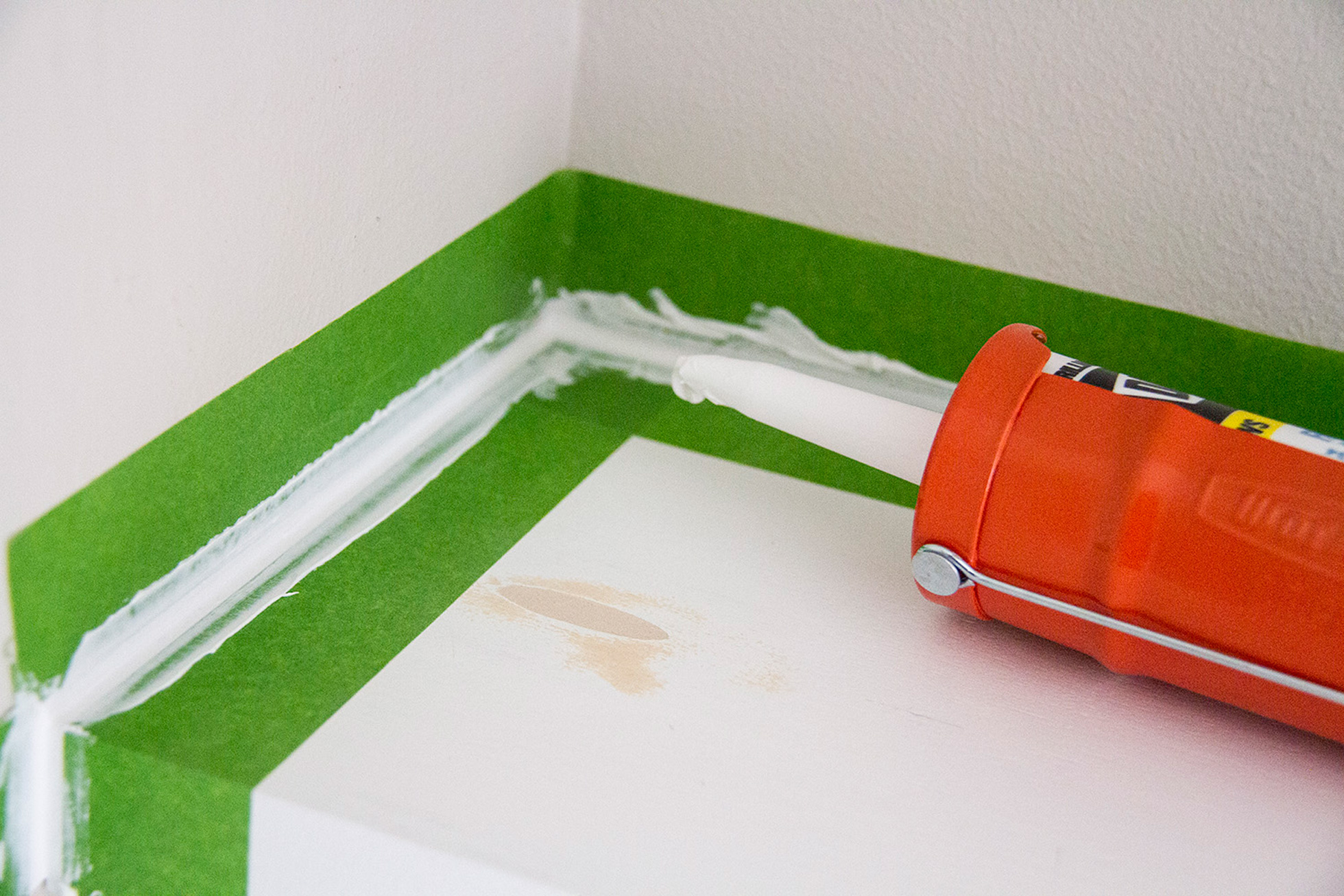 Use painters tape when caulking for straight lines