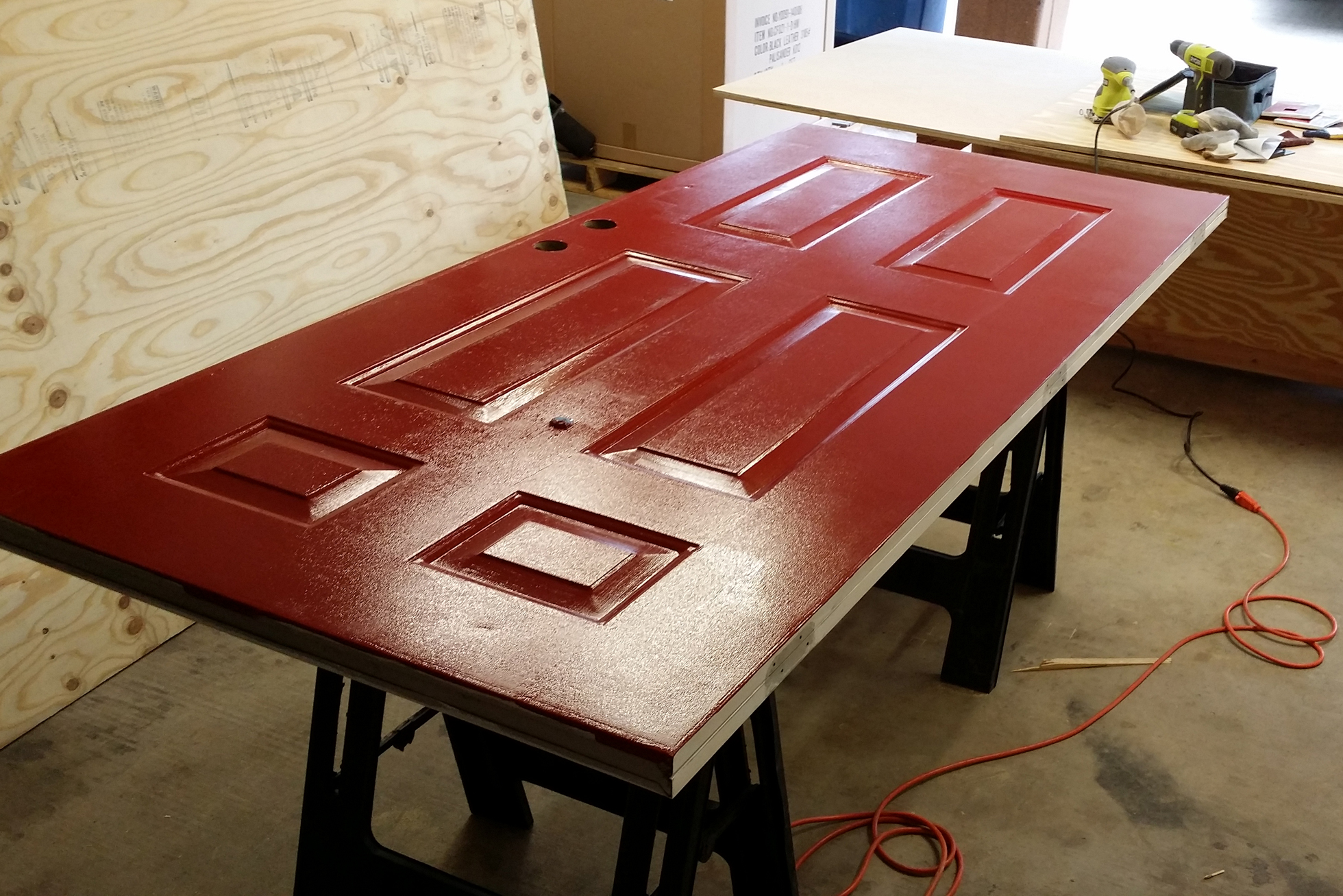Red door on sawhorses