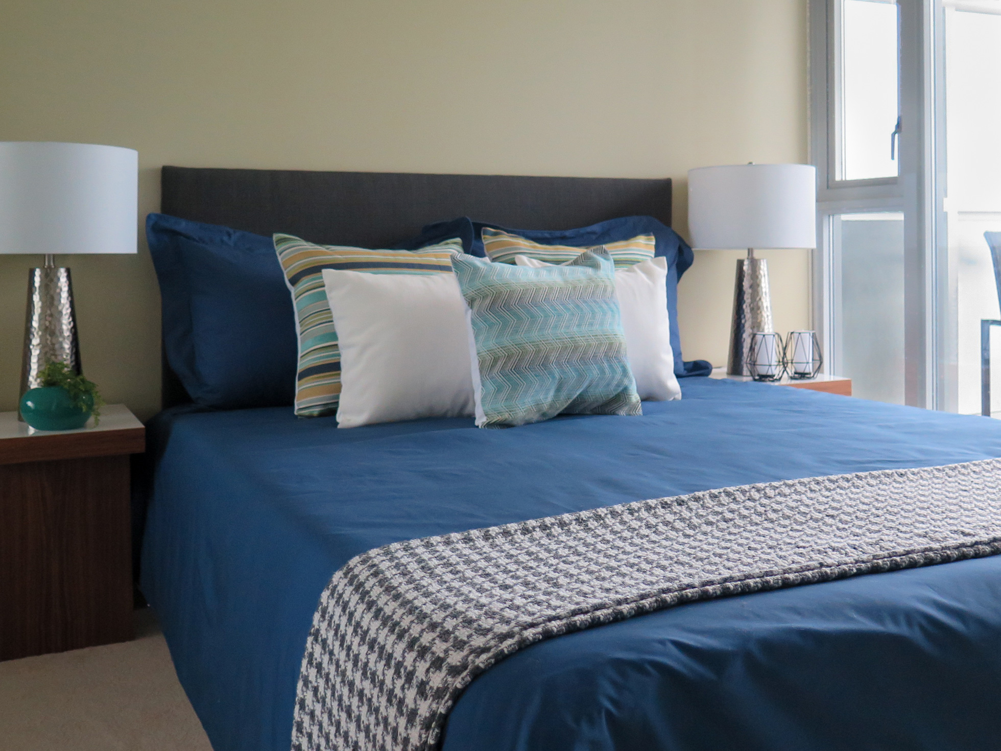 Neutral bedroom design in staged home