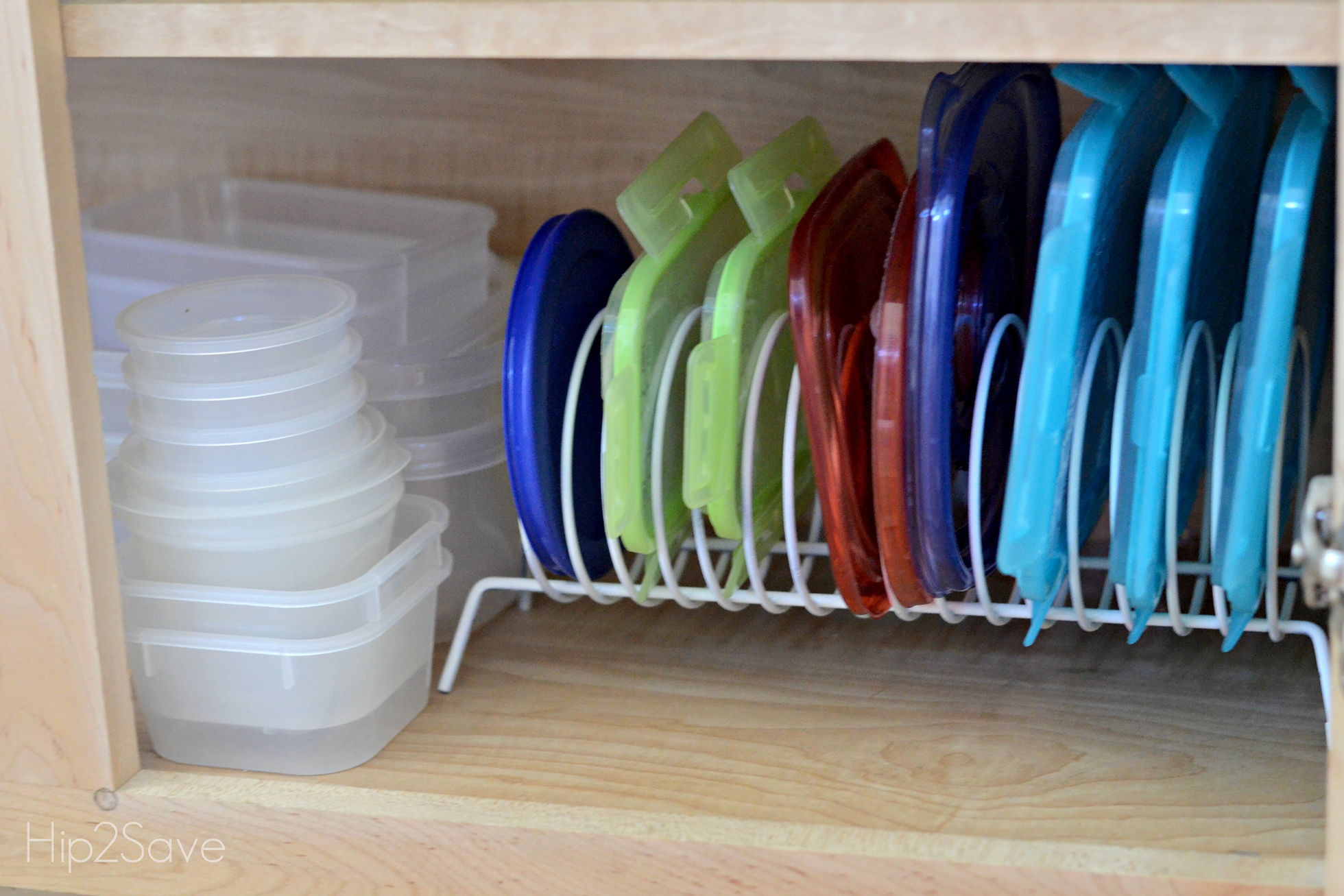 Tupperware lids stored in a CD holder