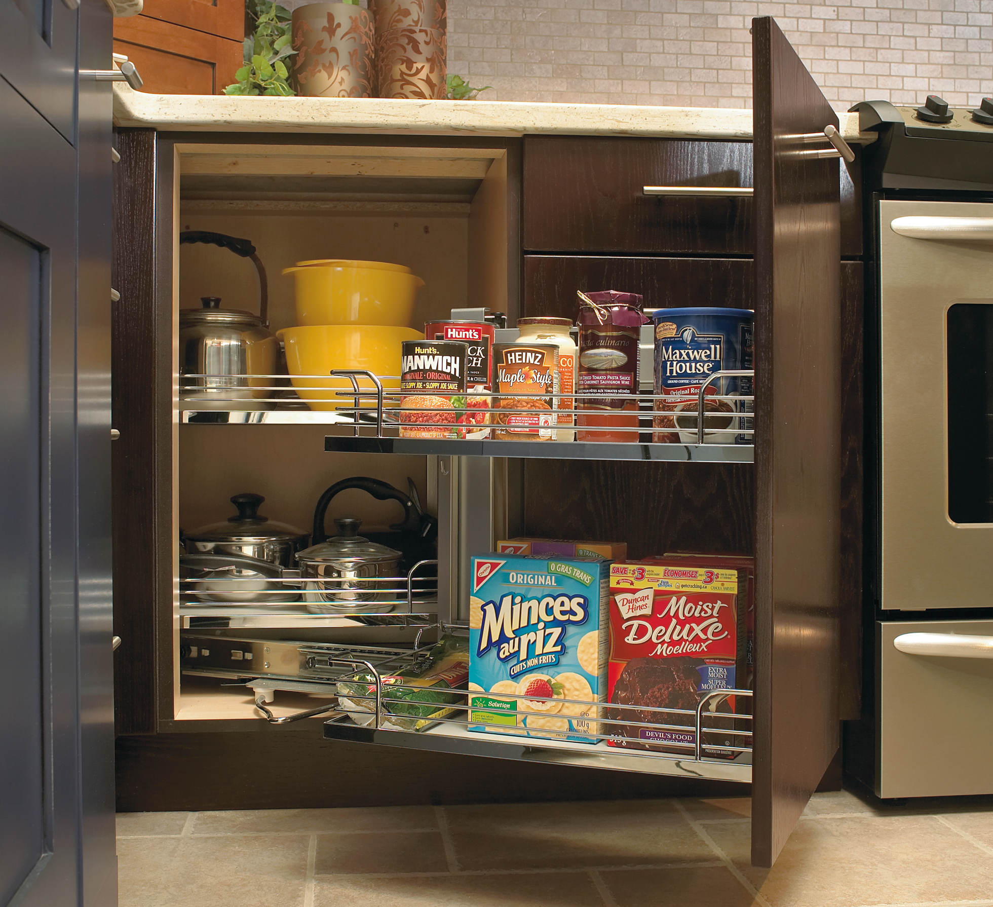 Pull-out cabinets hold food items in a kitchen