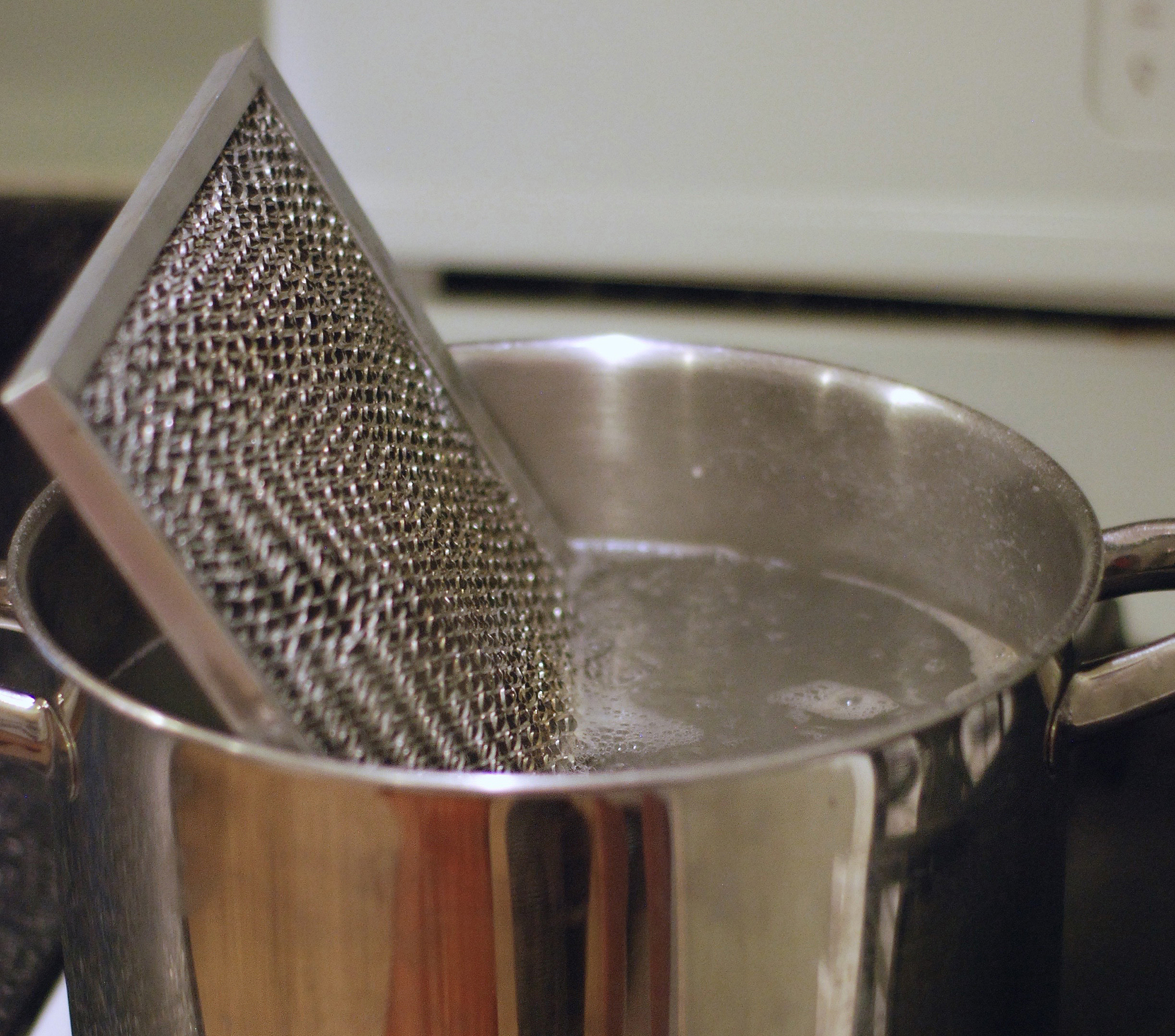 Boiling stove vent filter to clean them