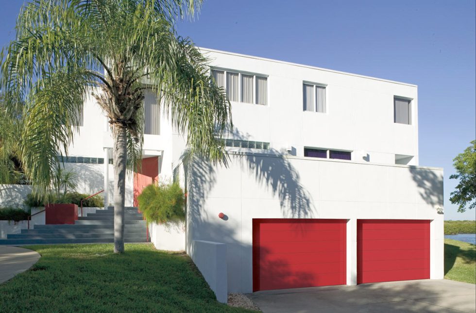 White house with bright red garage door
