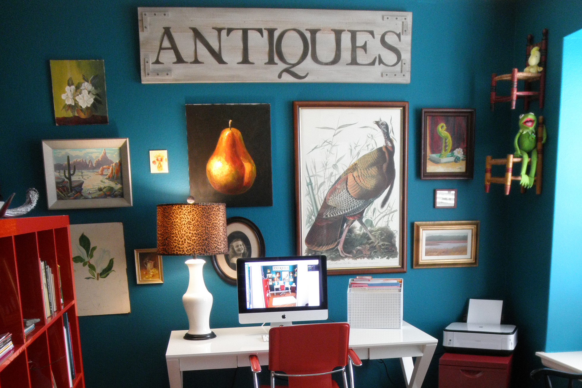 A bright blue painted wall in a home office