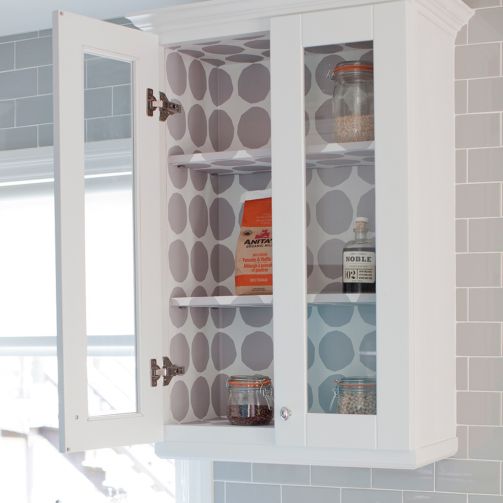 White kitchen cabinets with glass insert