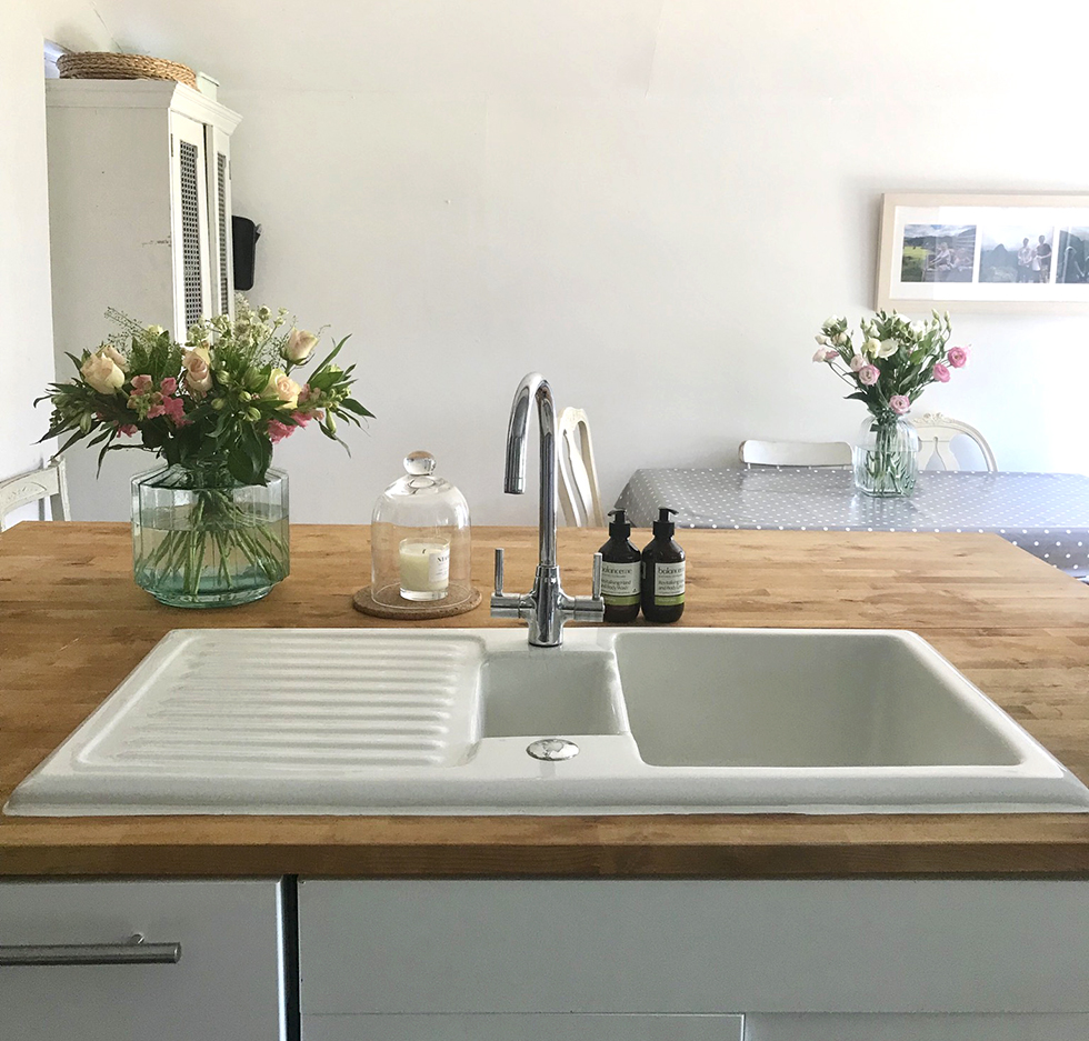 White sink in butcher's block counter | Kitchen Remodel